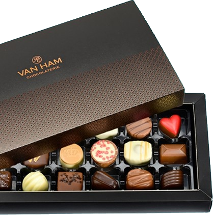 Geopende bonbondoos van Van Ham met bonbons in melk, wit en puur